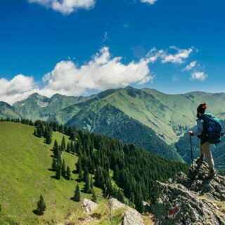 man standing on a rock
